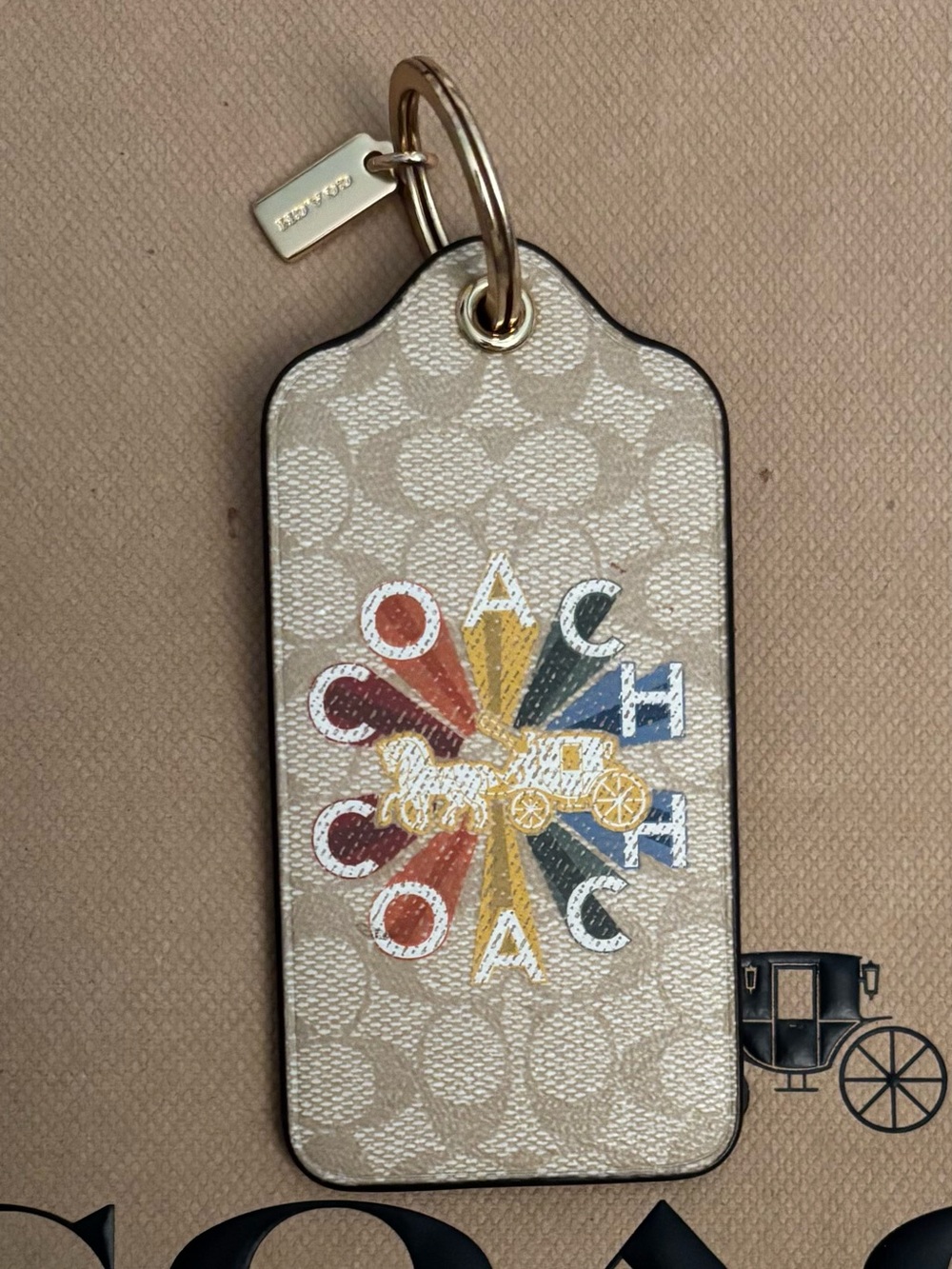 Coach Beige Signature Pattern Key Tag with Gold Hardware